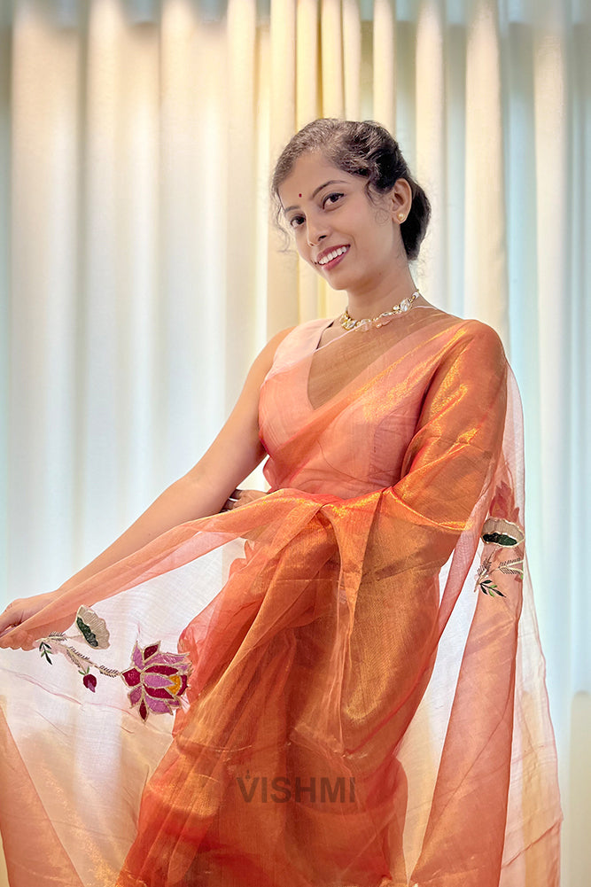 Orange Pure Metallic Muslin Silk Saree with Lotus Hand Embroidery