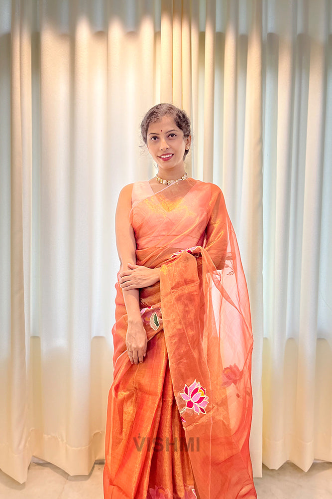Orange Pure Metallic Muslin Silk Saree with Lotus Hand Embroidery