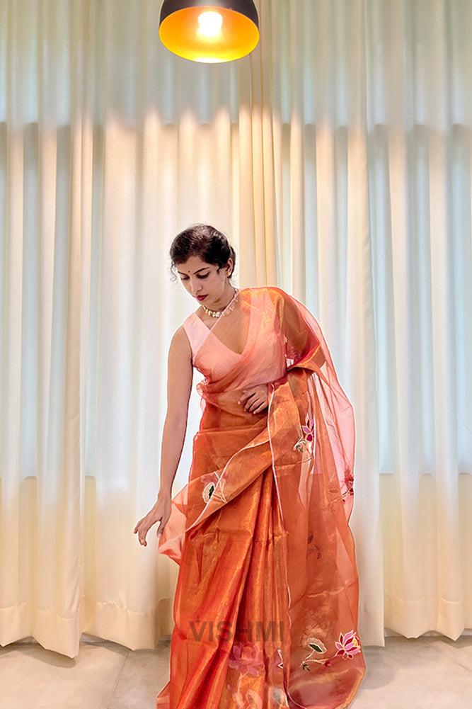 Orange Pure Metallic Muslin Silk Saree with Lotus Hand Embroidery