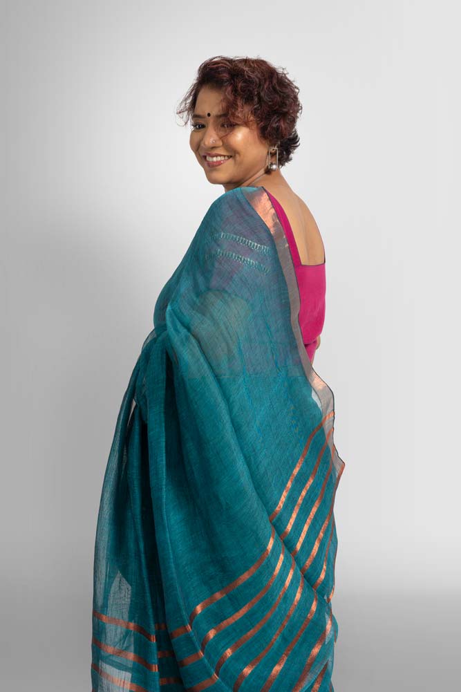 Dark Rama Green Plain Handloom Linen Saree with Copper Zari Strips Saree