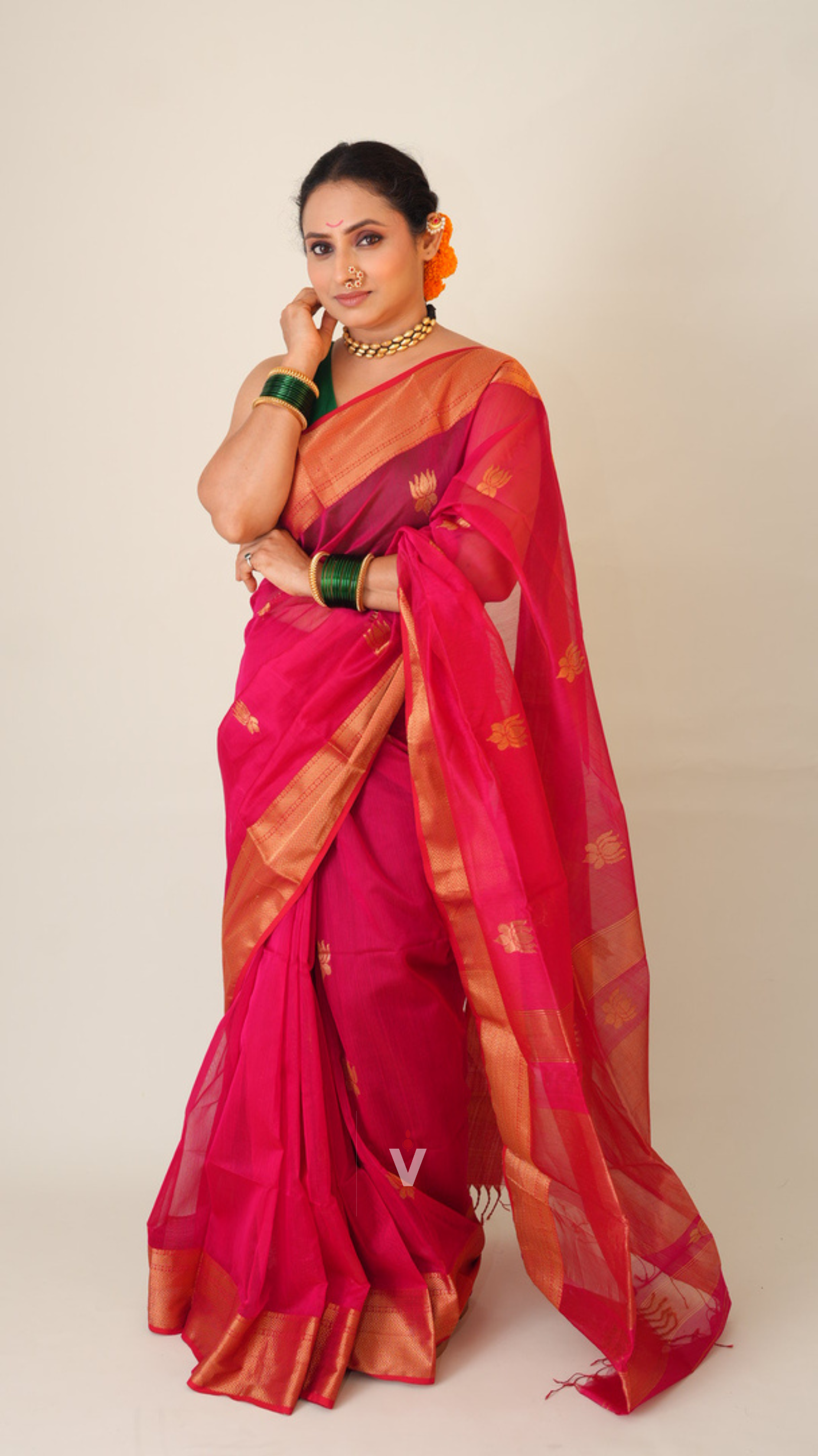 Graceful drape of Hot Pink Lotus Butti Handloom Maheshwari Saree for festive occasions