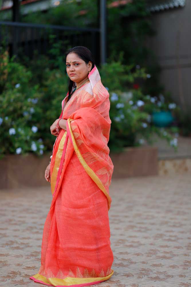 Orange Handloom Linen Saree with Temple work Zari Border