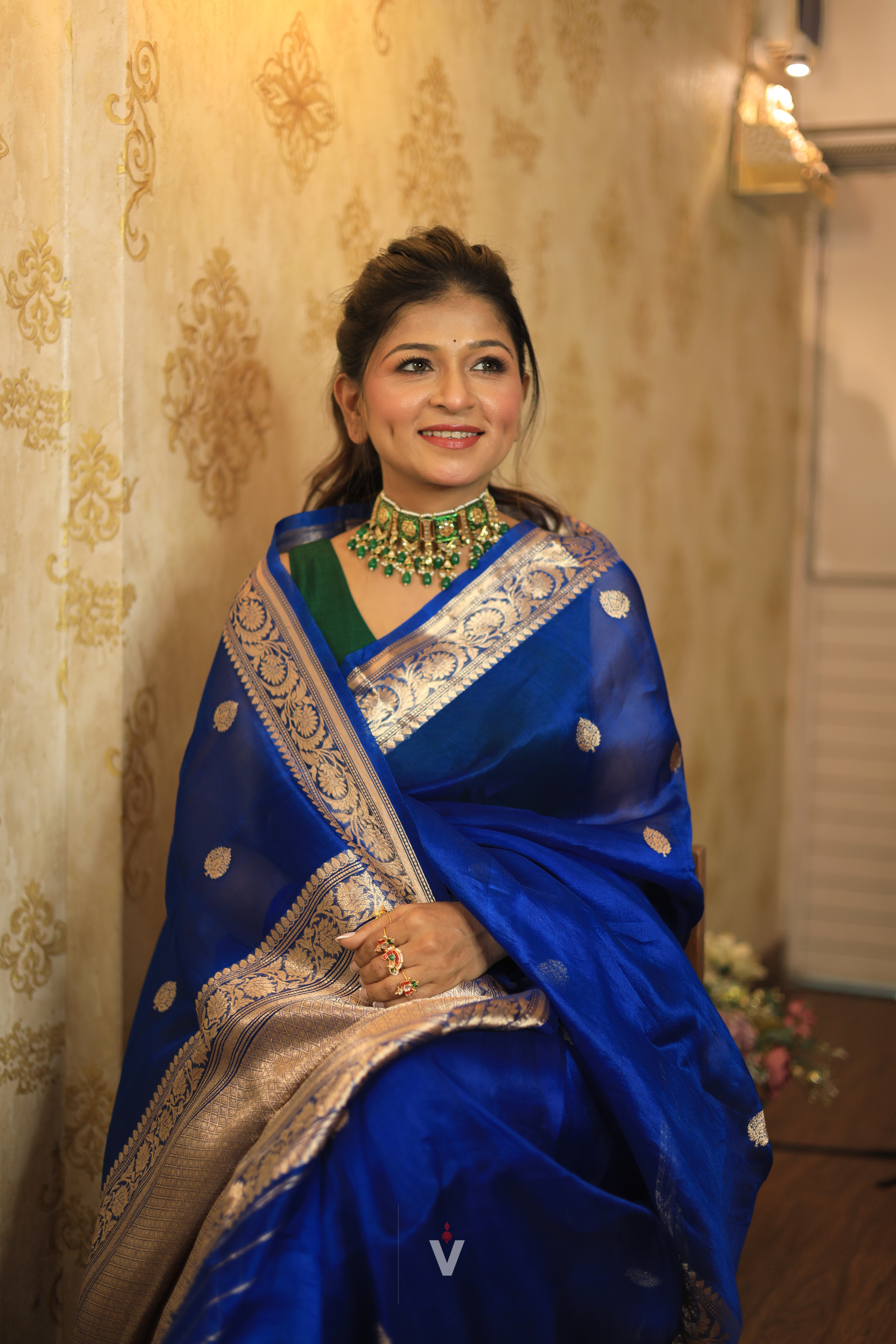 Close-up of intricate gold zari weaving on Royal Blue Kora Silk Handloom Banarasi Saree