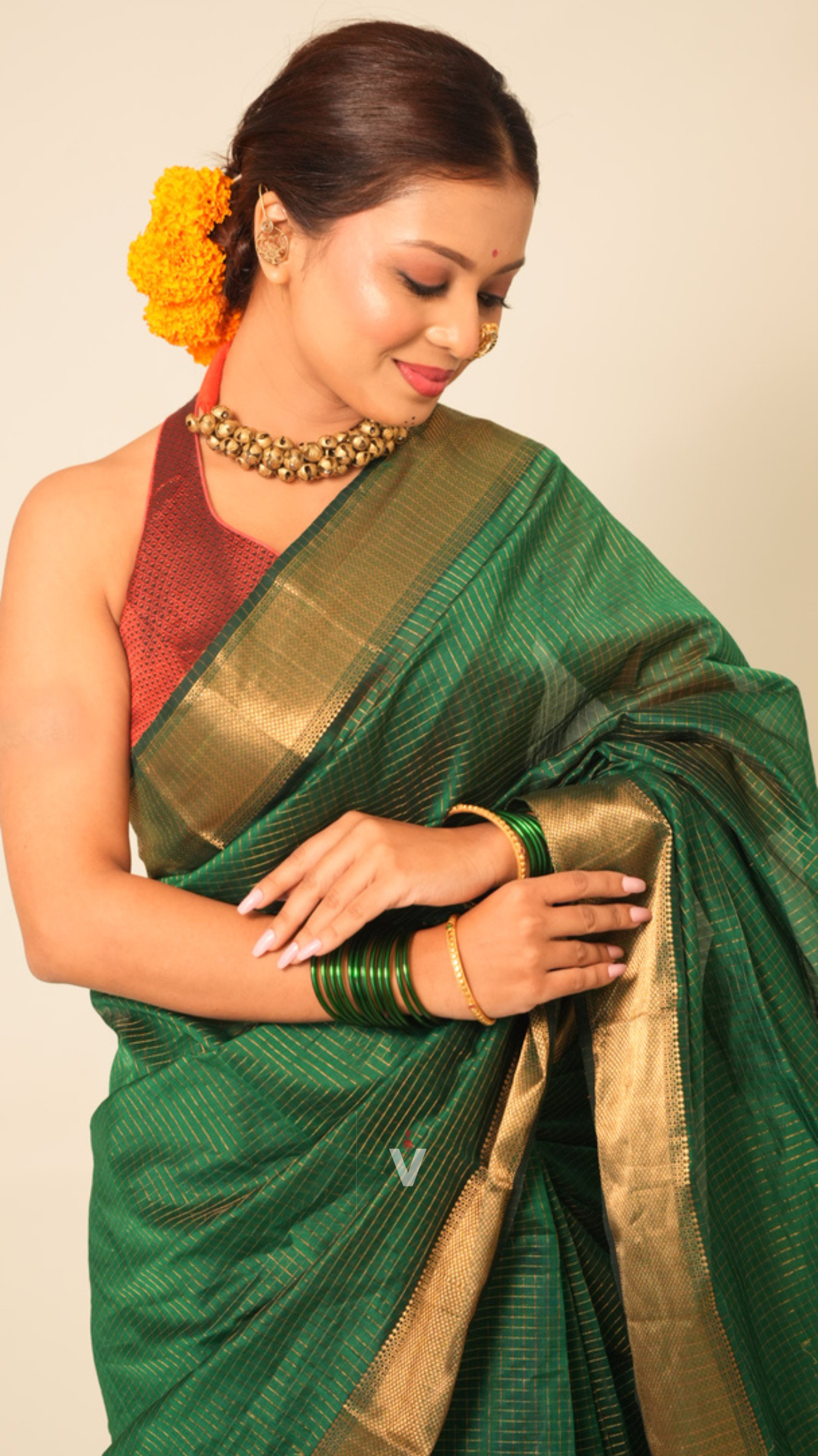 Green Maheshwari Handloom Saree with fine zari check pattern and elegant border